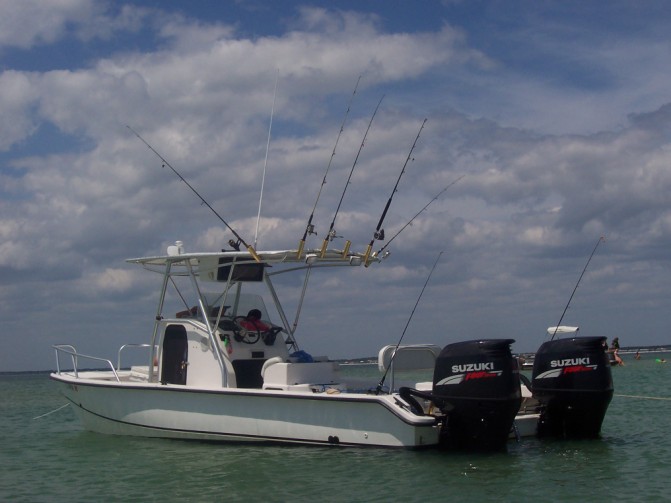 18 rod holders; 200 quart cooler and center console rated for 12 people; 6 allowed on charter via USCG requirements